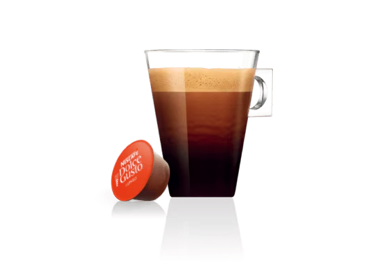 Grote koffiekop en capsule
